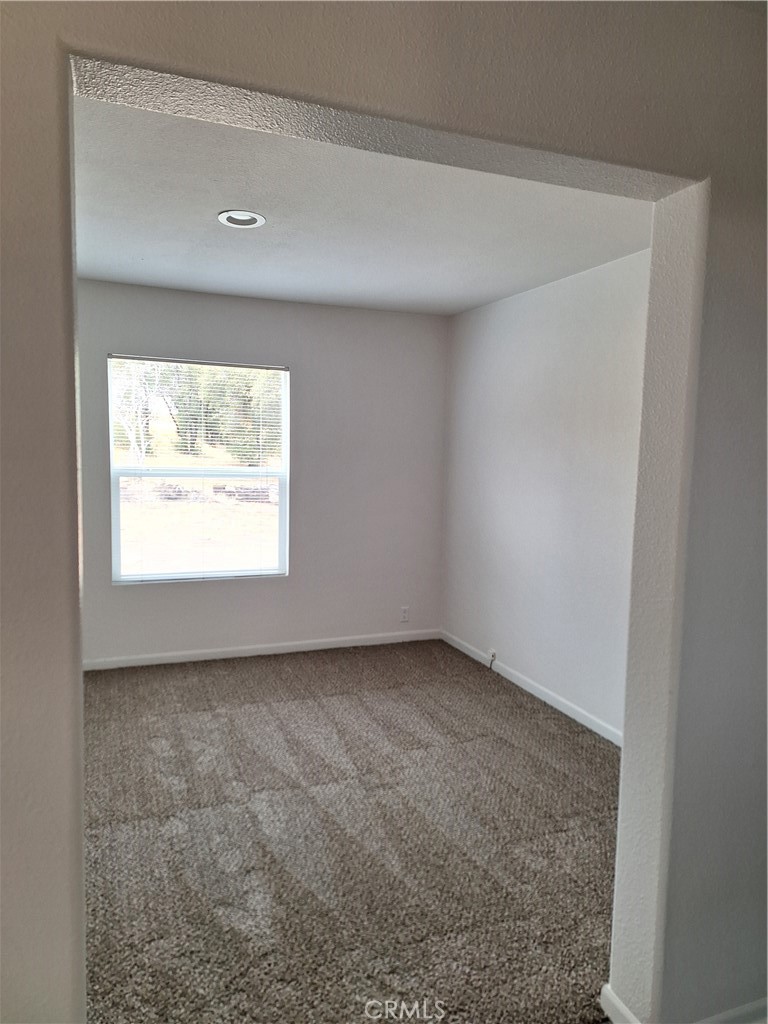 3708 Highway 140 Mariposa, CA 95338 - Photo 16 of 19 an empty room with a window