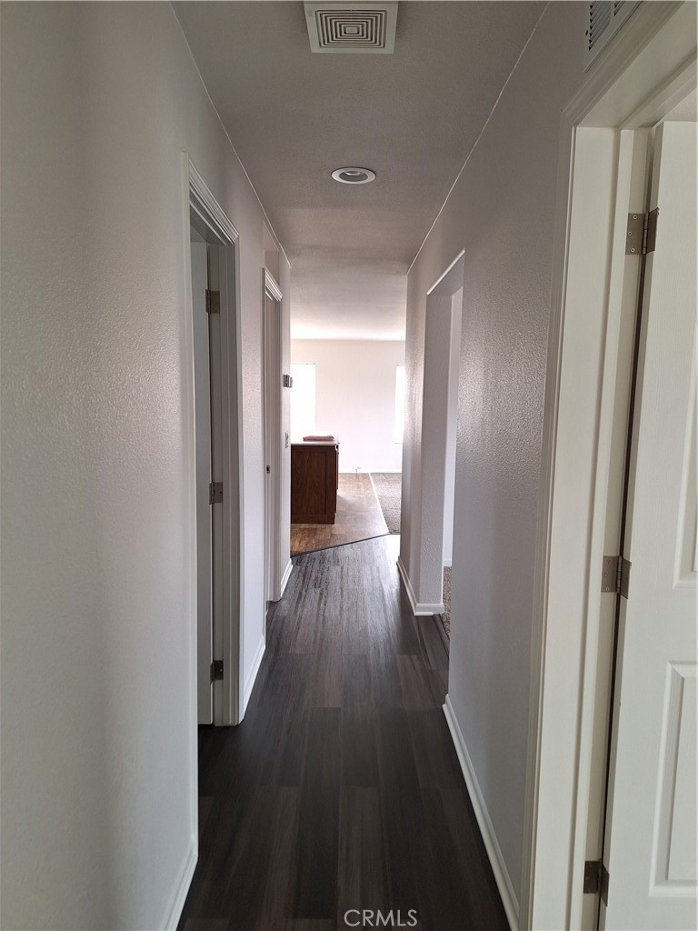 3708 Highway 140 Mariposa, CA 95338 - Photo 19 of 19 a view of a hallway with wooden floor