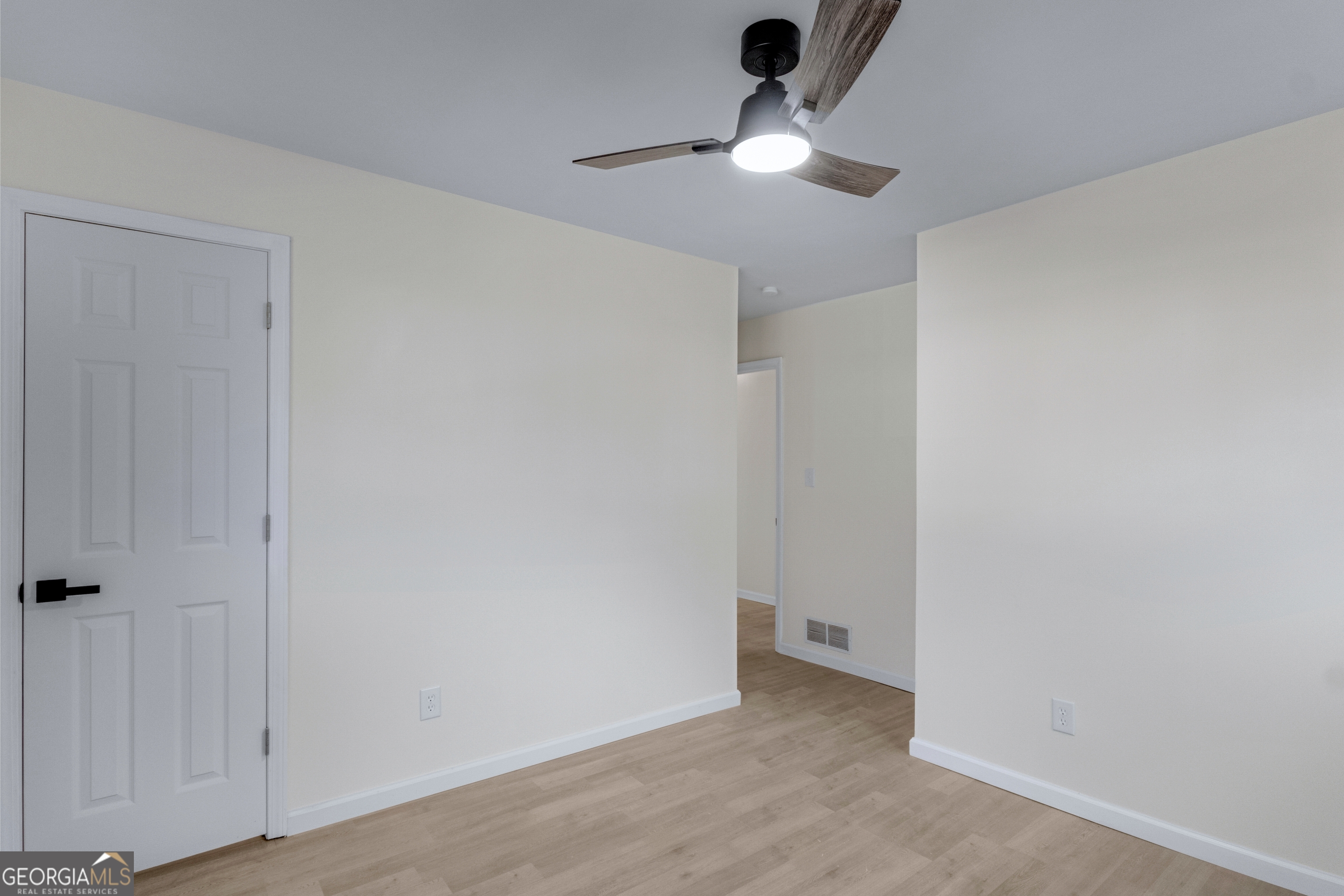 6695 Cedar Hurst Trail Atlanta, GA 30349 - Photo 13 of 23 a view of an empty room