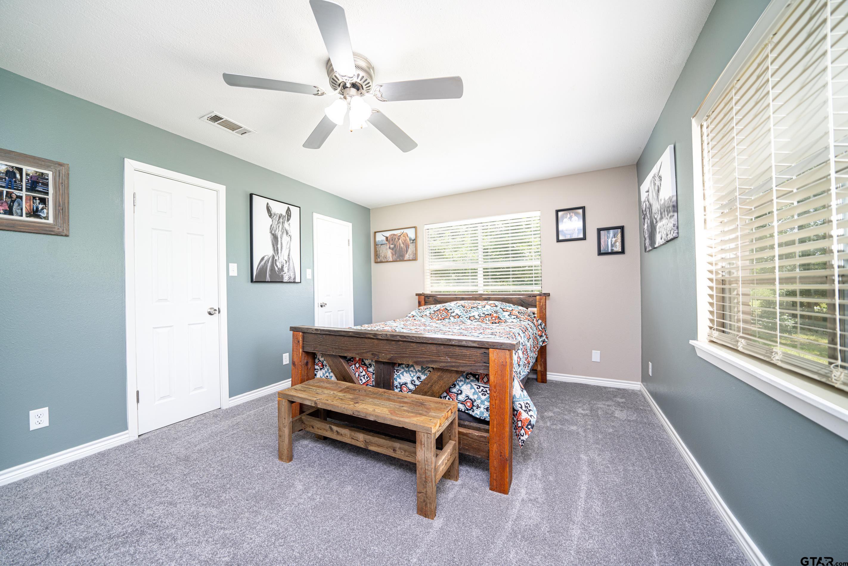 2536 Elk Road Gilmer, TX 75644 - Photo 16 of 32 a living room with furniture and a window