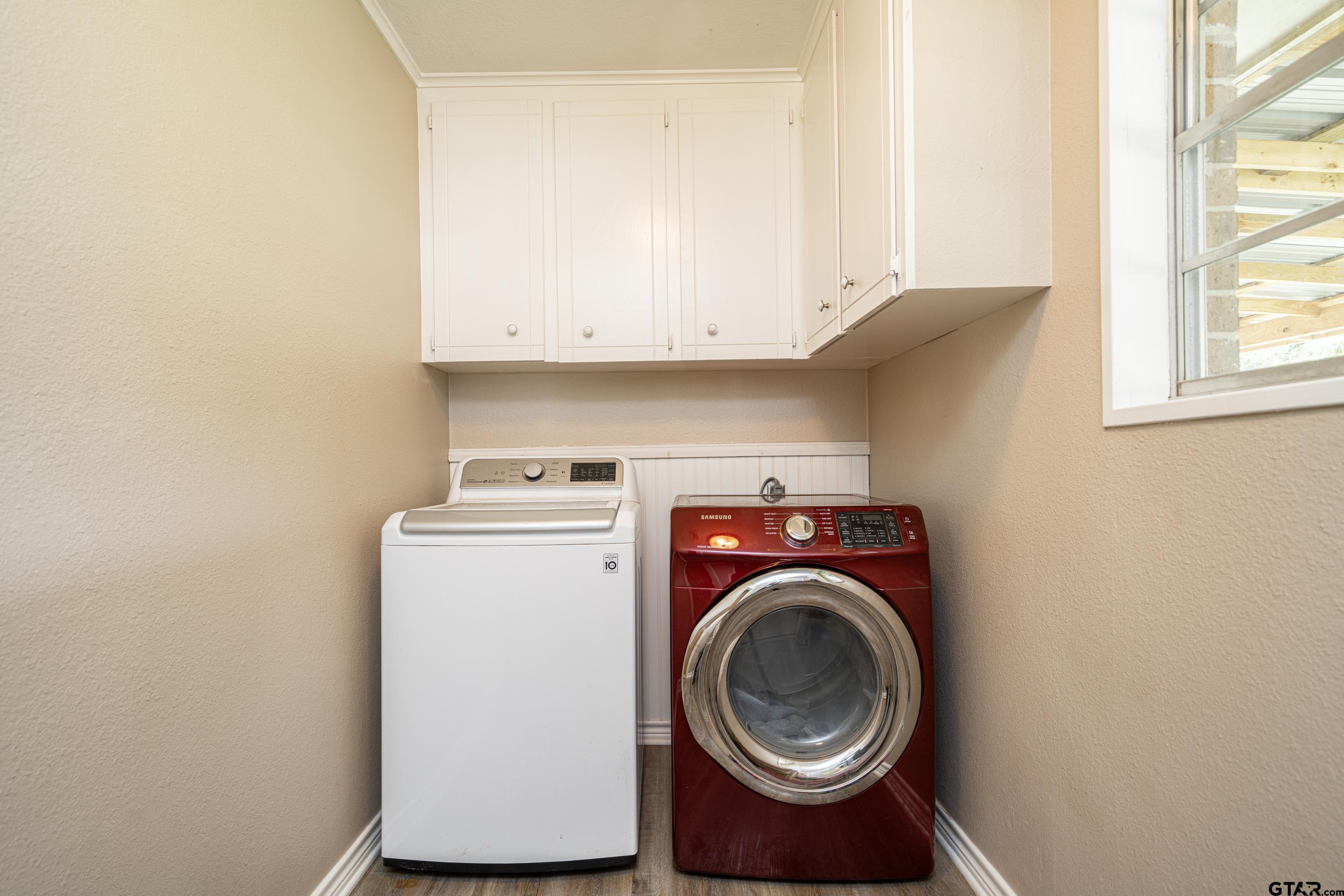2536 Elk Road Gilmer, TX 75644 - Photo 21 of 32 a utility room with dryer and washer