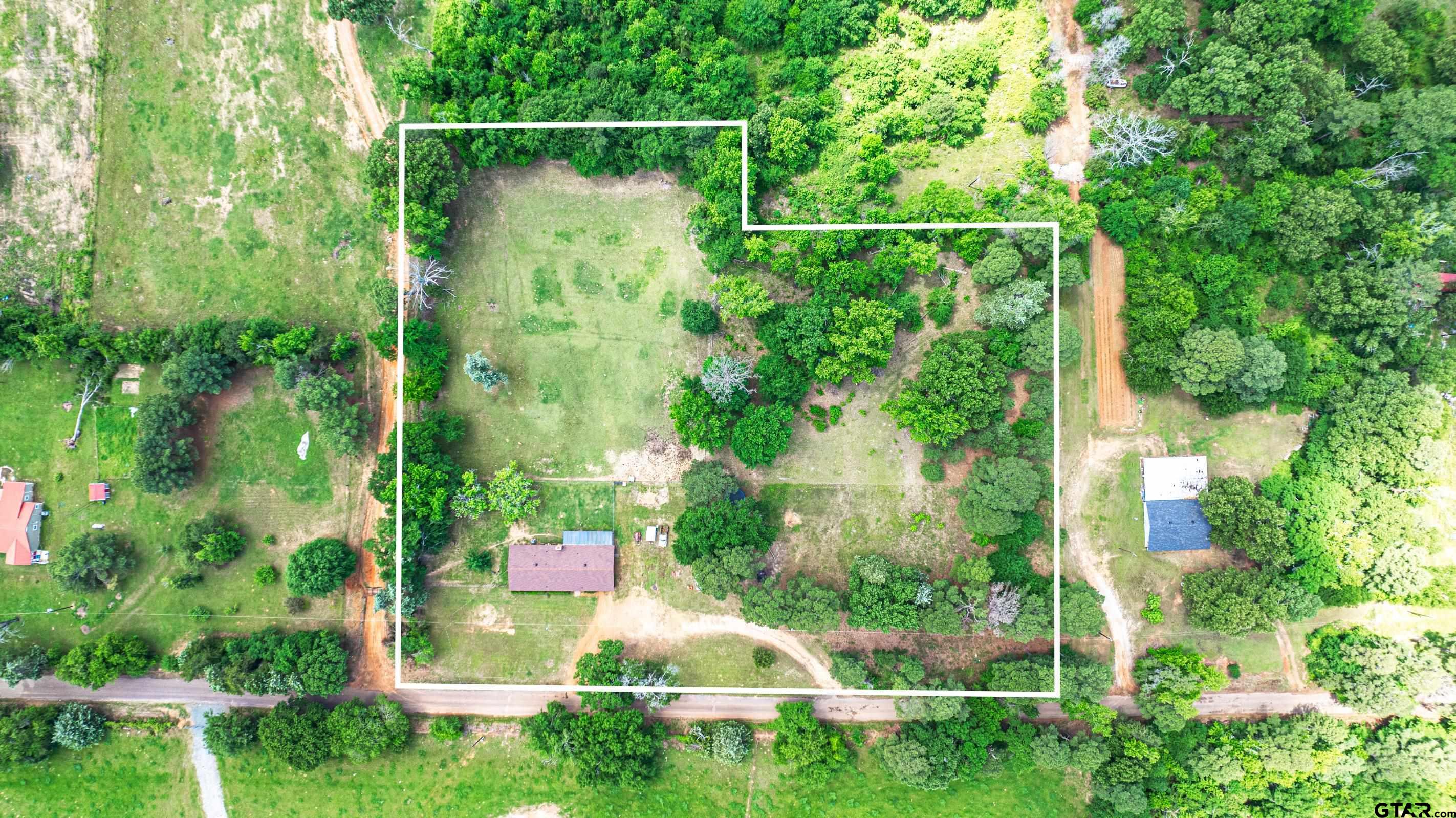 2536 Elk Road Gilmer, TX 75644 - Photo 28 of 32 a garden view with a garden