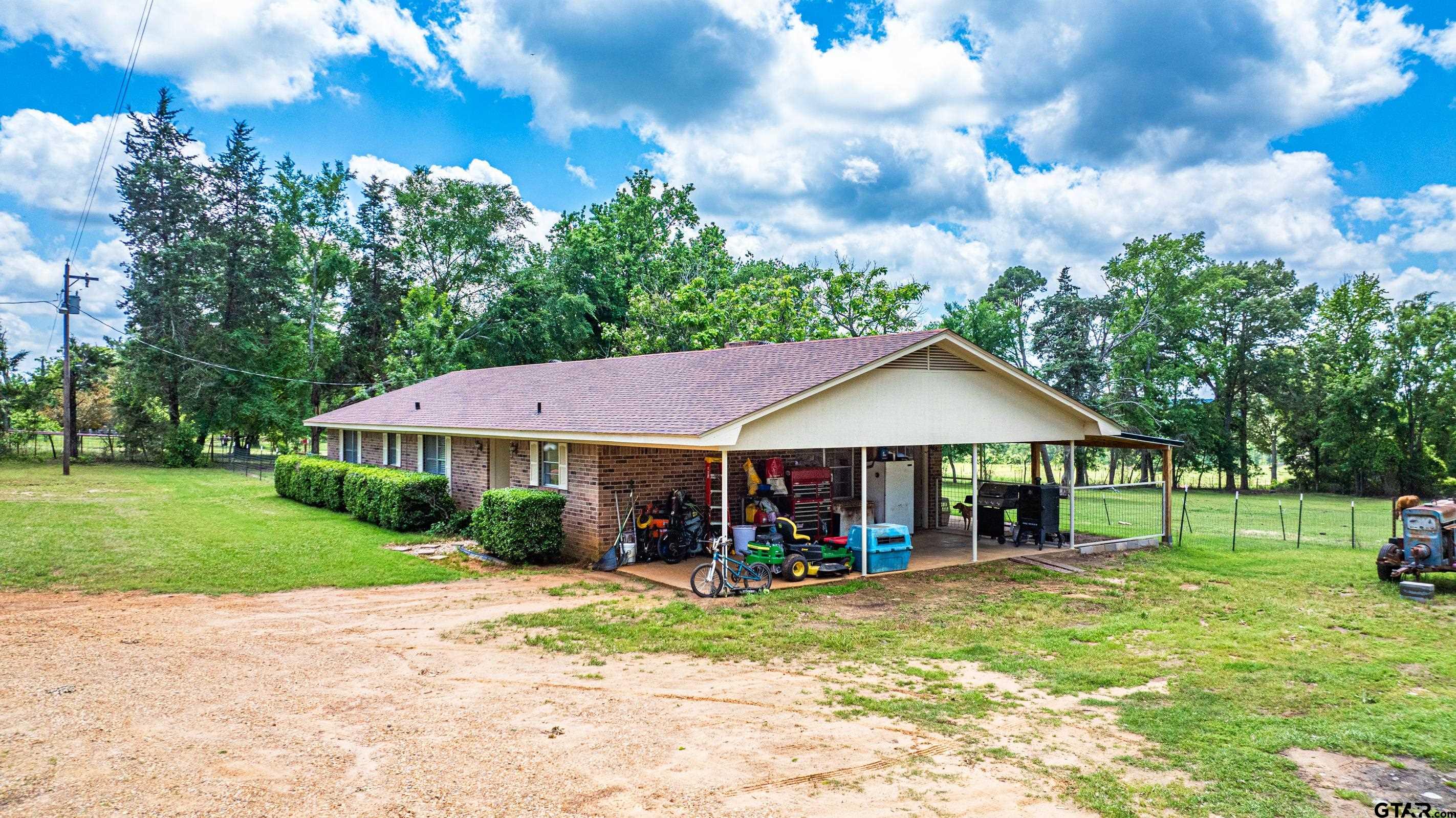 2536 Elk Road Gilmer, TX 75644 - Photo 3 of 32 a view of outdoor space yard and deck