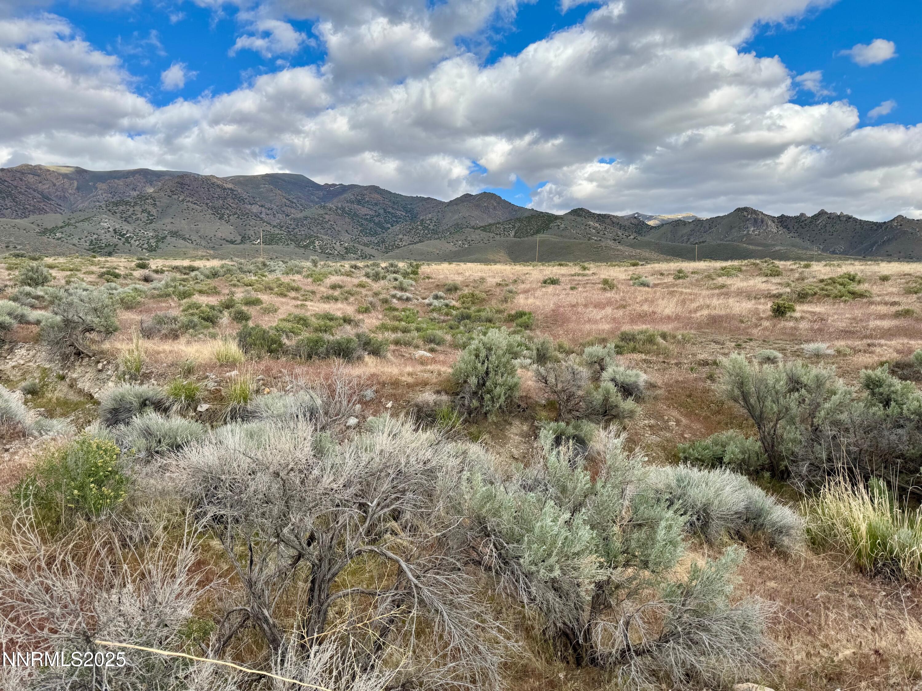 a view of a lake and mountain