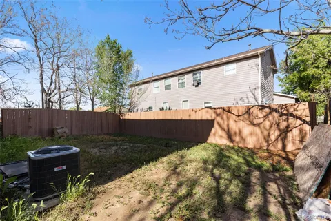 a view of a backyard of the house