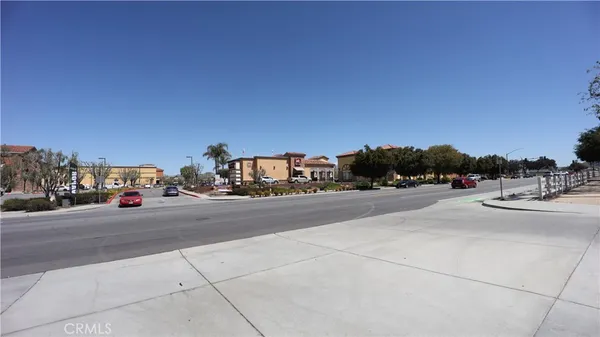 a view of street with cars
