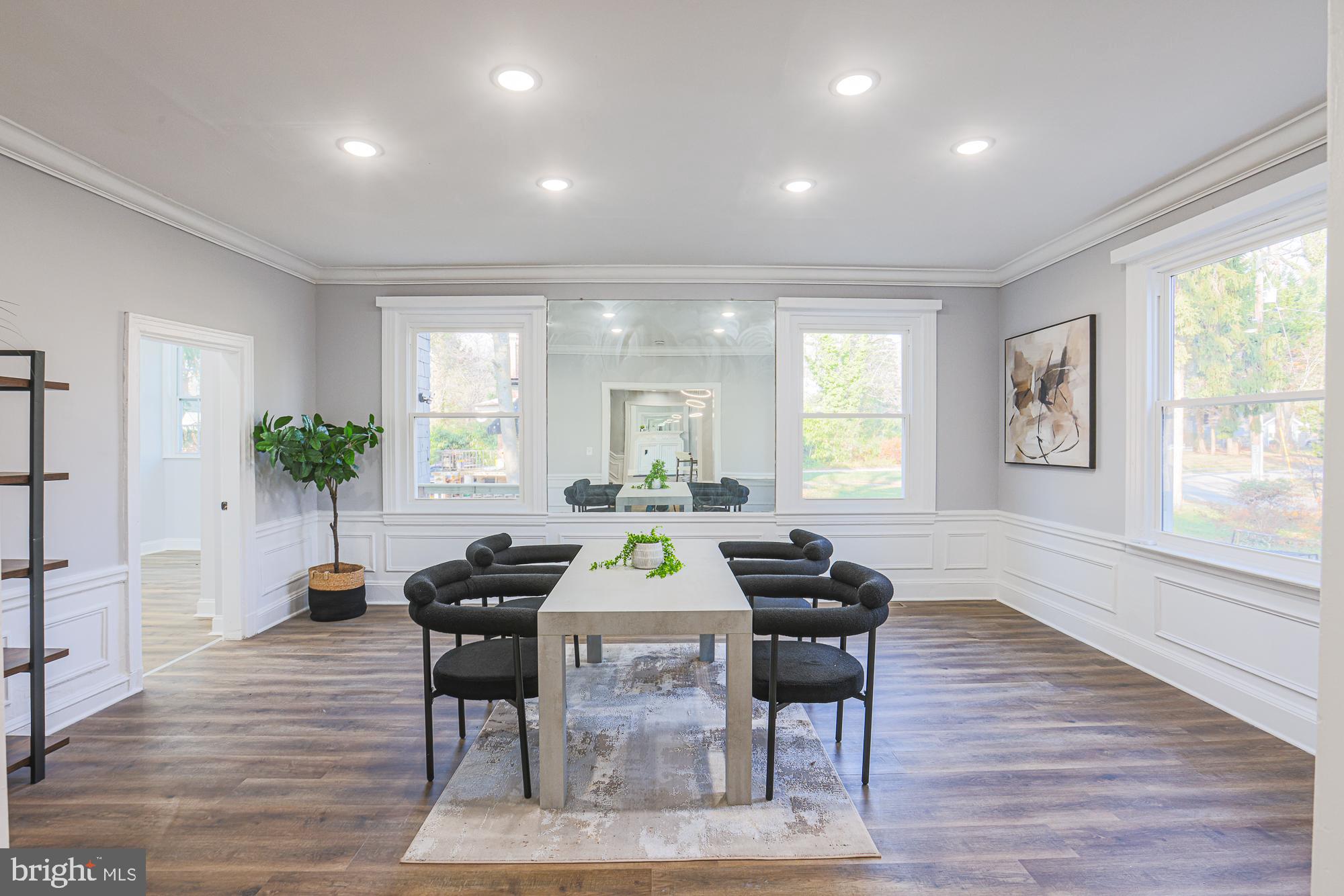 2606 Queen Anne Road Baltimore, MD 21216 - Photo 28 of 92 a living room with furniture and a wooden floor