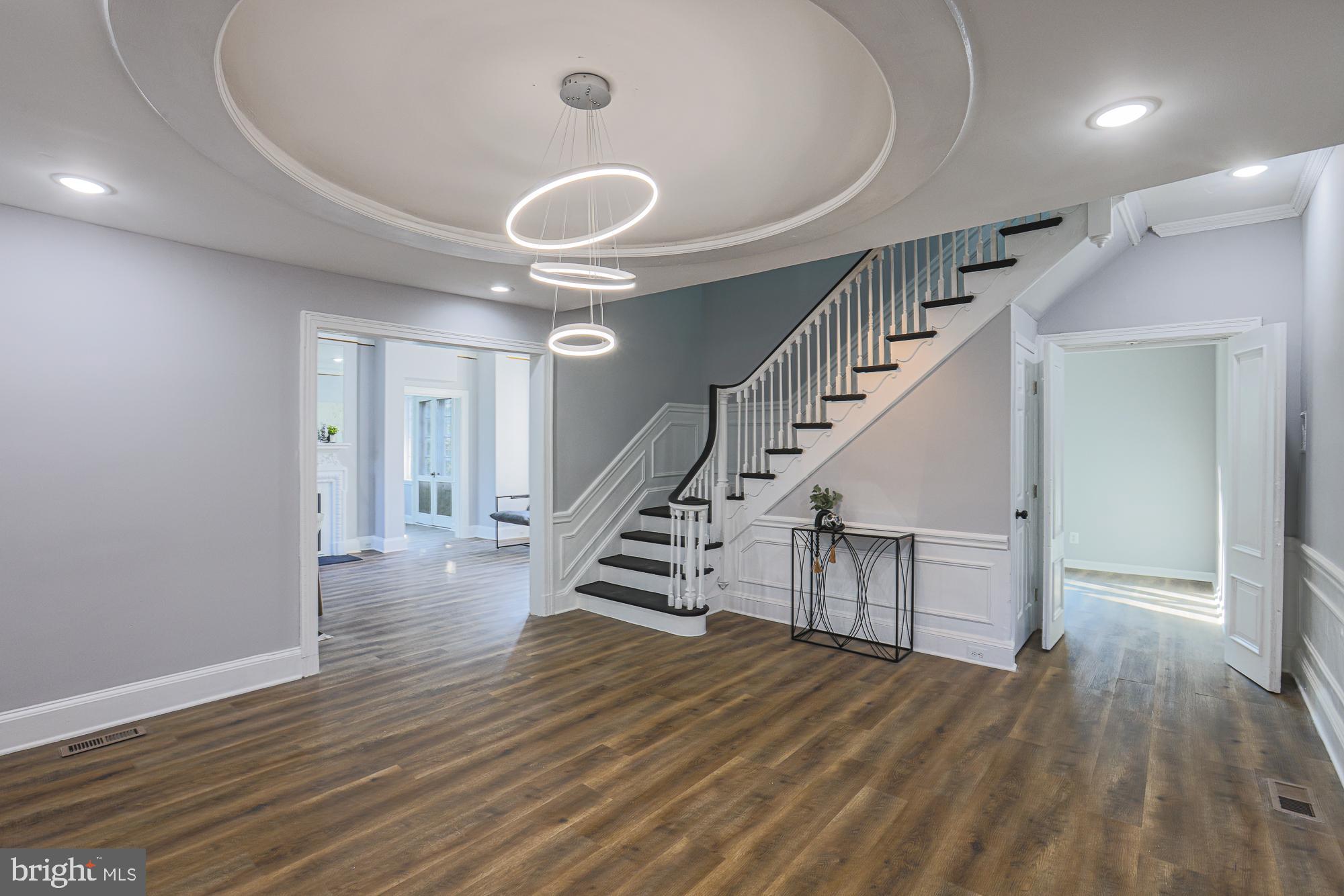 2606 Queen Anne Road Baltimore, MD 21216 - Photo 31 of 92 a view of entryway and hall with wooden floor