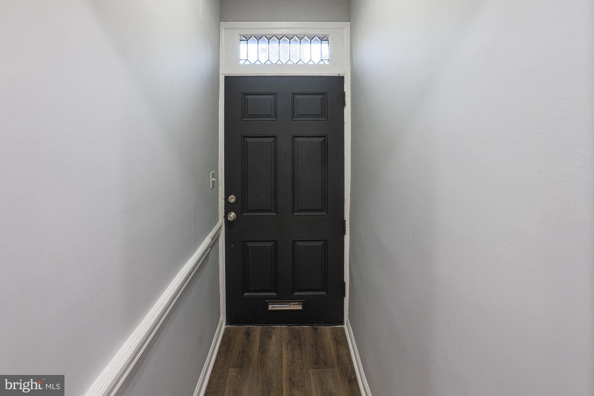 2606 Queen Anne Road Baltimore, MD 21216 - Photo 32 of 92 Inviting entrance with modern charm.