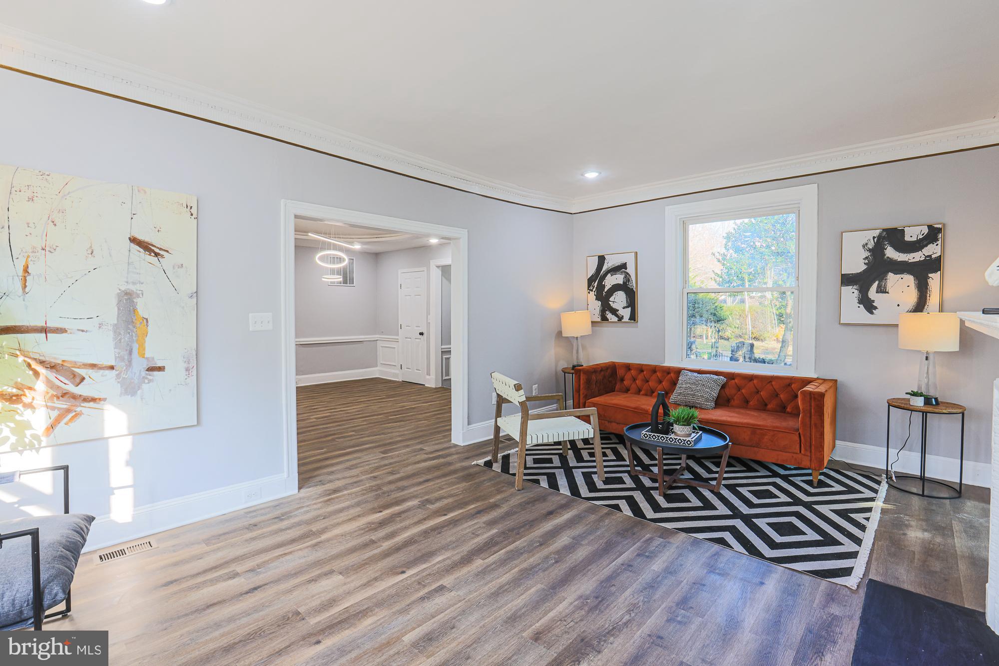 2606 Queen Anne Road Baltimore, MD 21216 - Photo 38 of 92 Bright, modern living space with artistic flair.