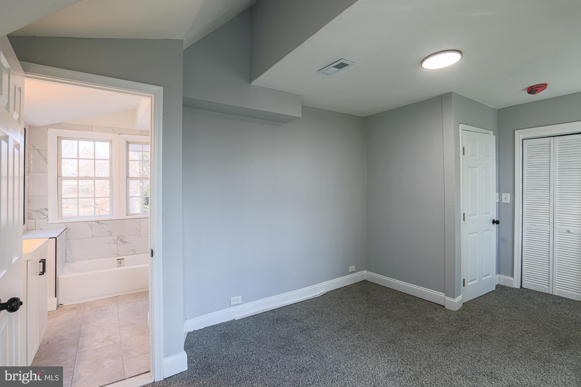 2606 Queen Anne Road Baltimore, MD 21216 - Photo 58 of 92 Spacious room with natural light and charm.
