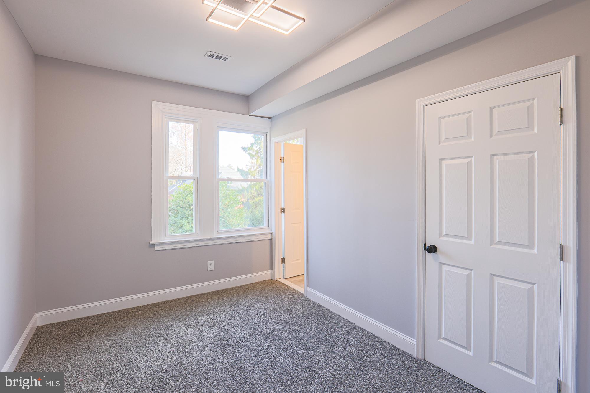 2606 Queen Anne Road Baltimore, MD 21216 - Photo 73 of 92 Bright and airy room with fresh finishes.