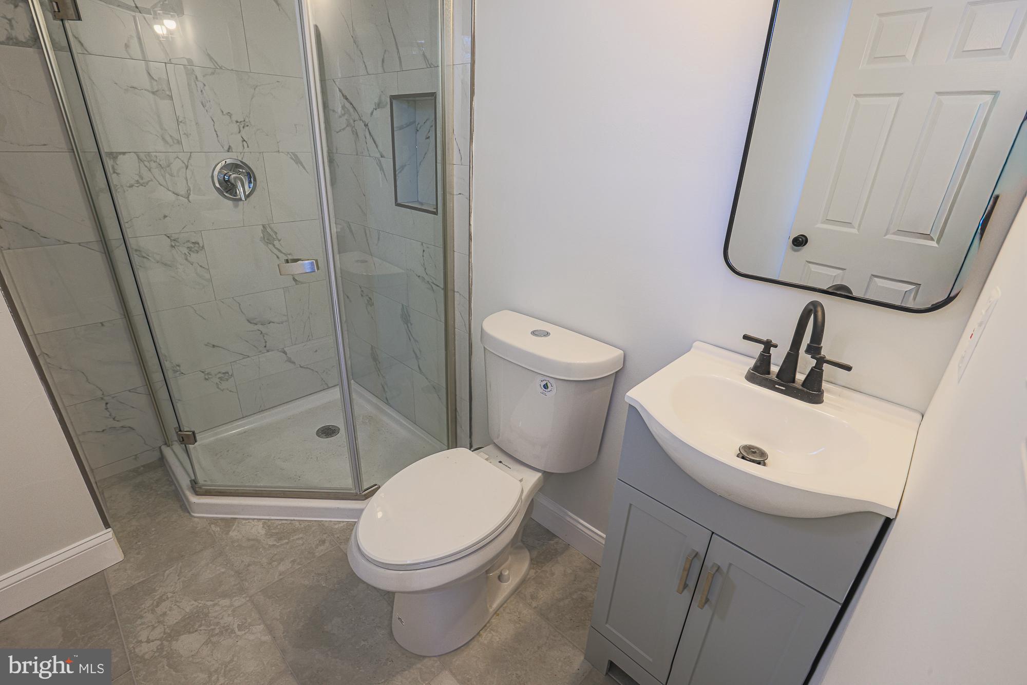 2606 Queen Anne Road Baltimore, MD 21216 - Photo 75 of 92 Modern bathroom with sleek finishes.