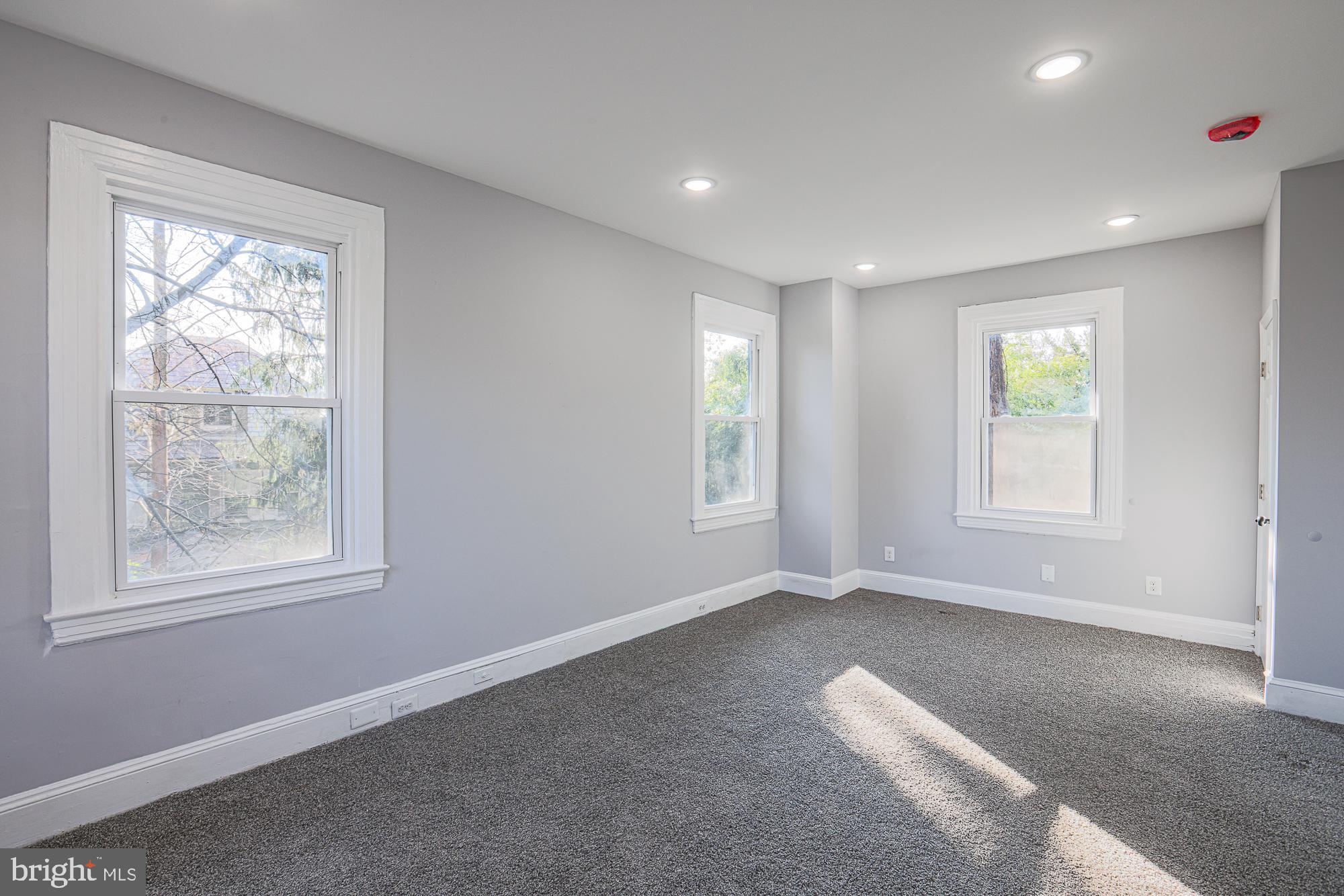 2606 Queen Anne Road Baltimore, MD 21216 - Photo 79 of 92 a view of an empty room with a window