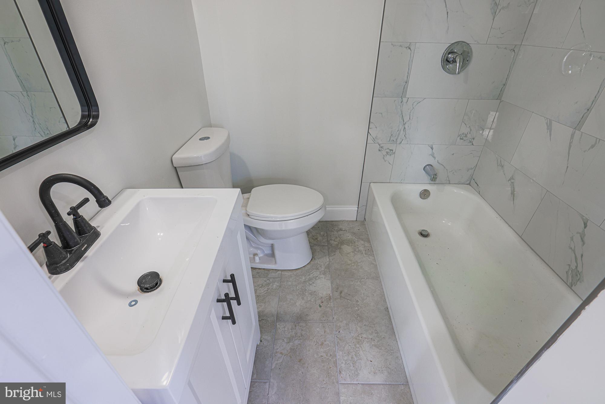 2606 Queen Anne Road Baltimore, MD 21216 - Photo 80 of 92 Modern bathroom with sleek finishes.