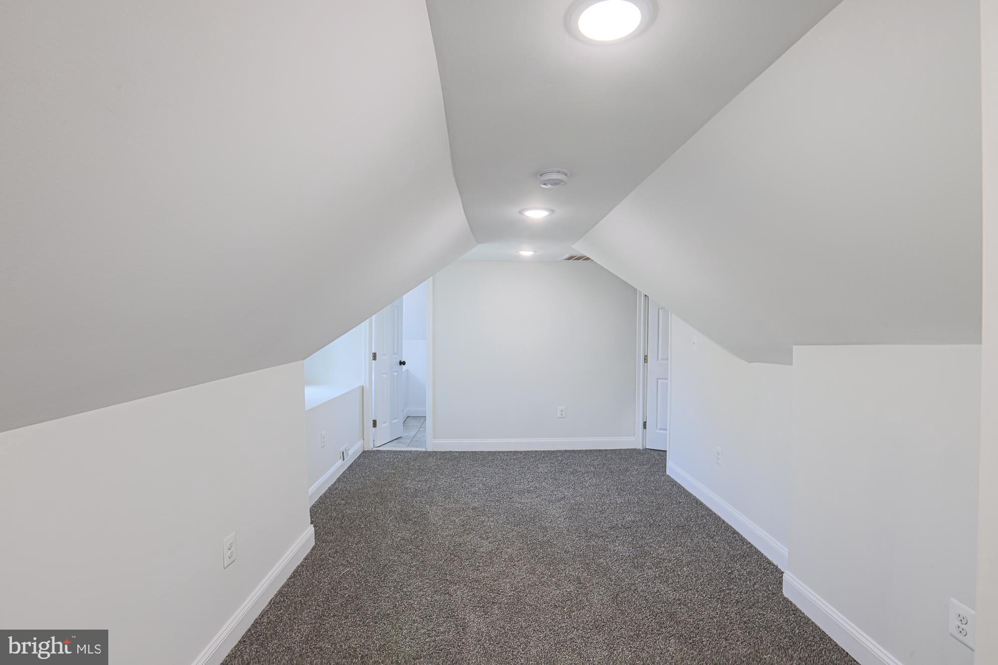 2606 Queen Anne Road Baltimore, MD 21216 - Photo 82 of 92 Spacious attic retreat with modern charm.