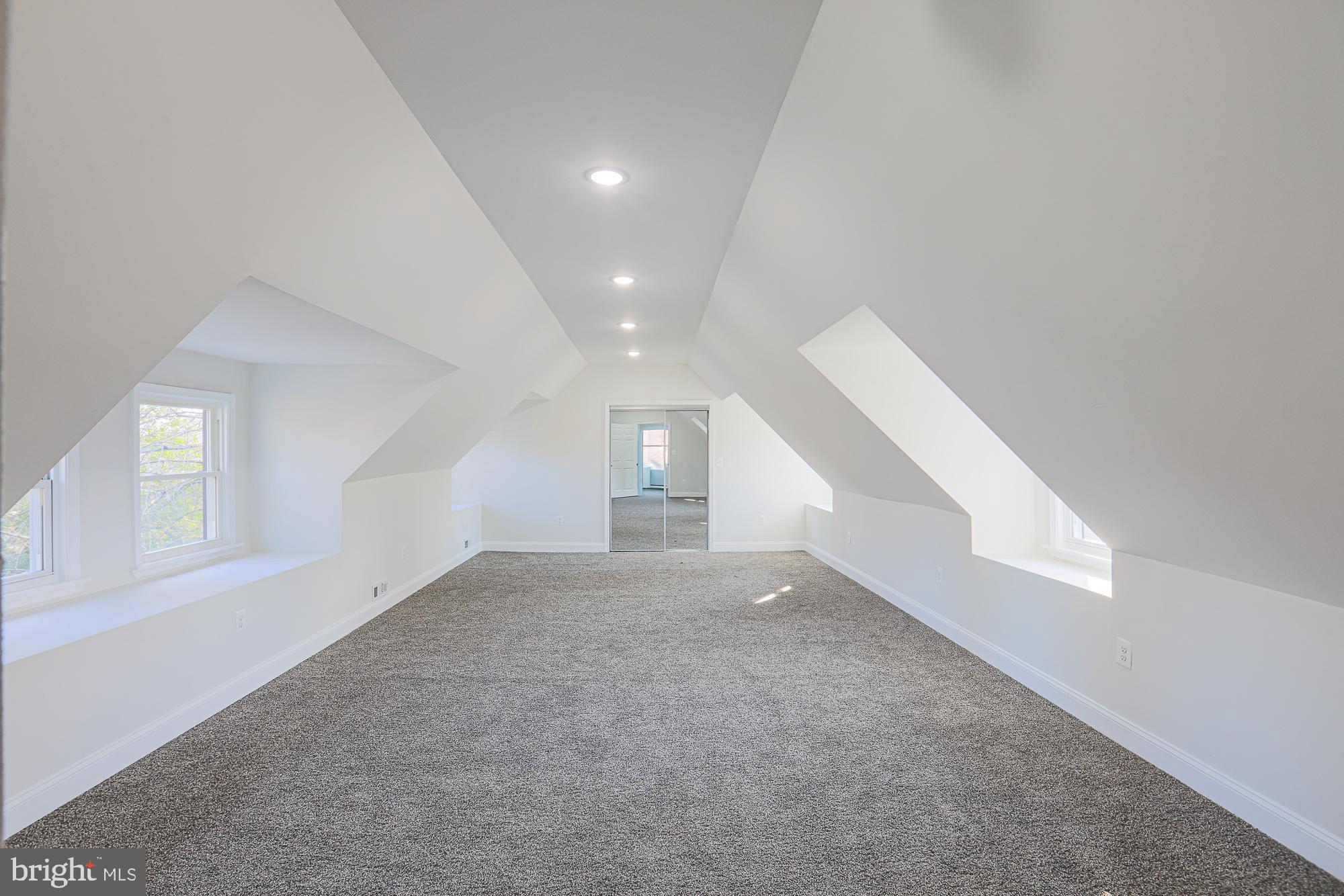 2606 Queen Anne Road Baltimore, MD 21216 - Photo 84 of 92 an empty room with windows and closet