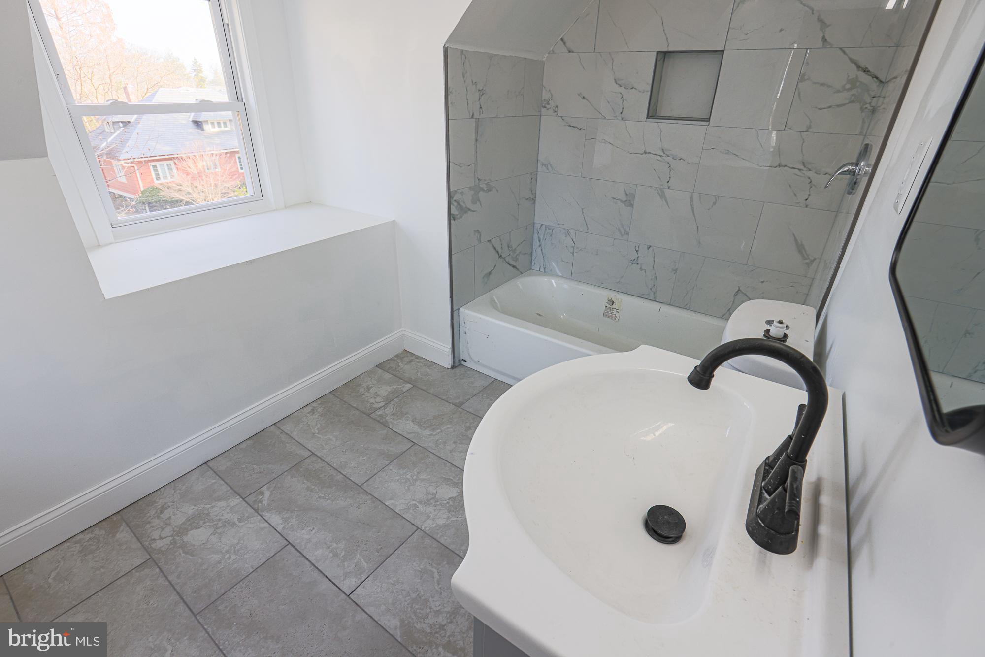 2606 Queen Anne Road Baltimore, MD 21216 - Photo 87 of 92 Modern bathroom with elegant finishes.