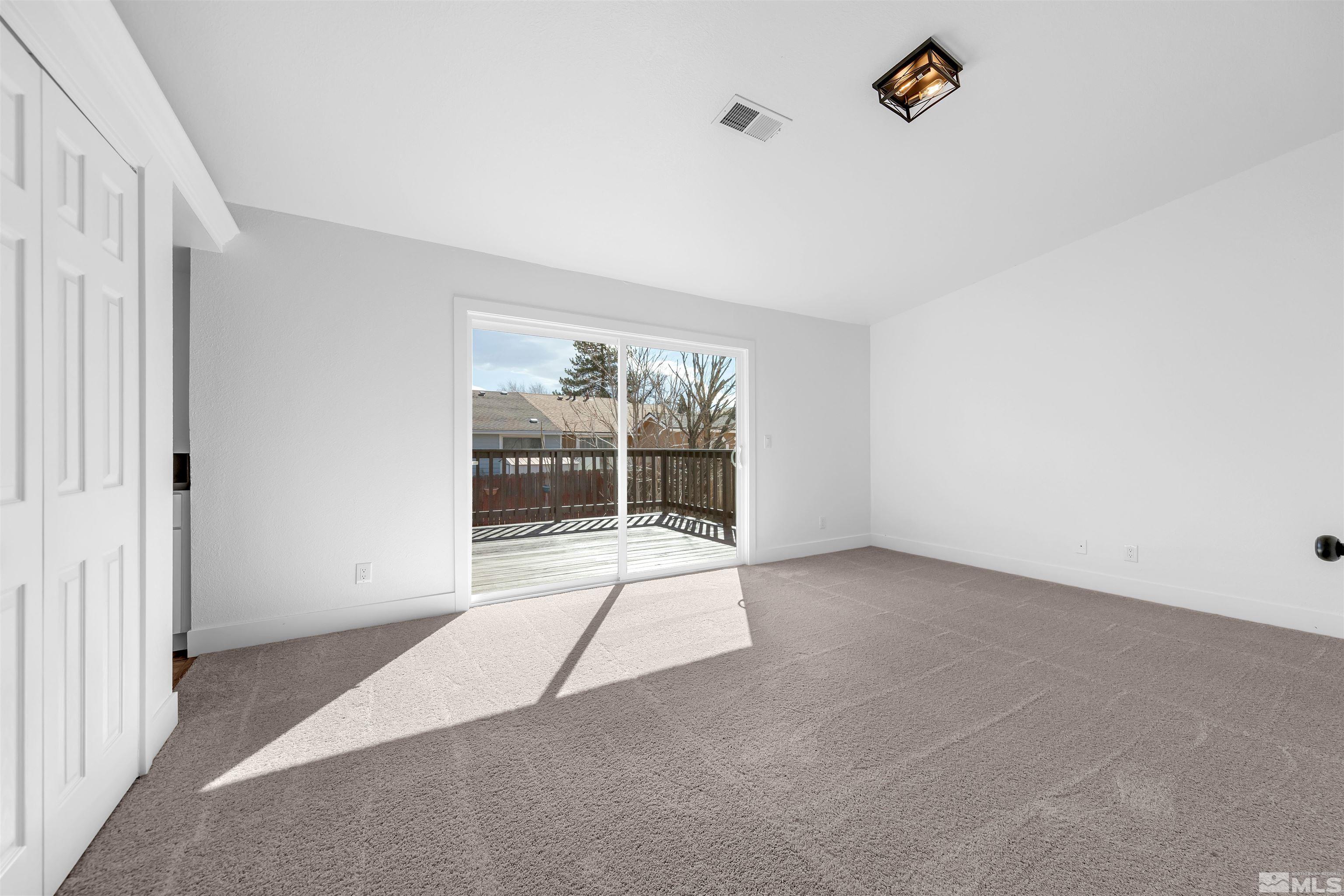 6768 Peppermint Court Reno, NV 89506 - Photo 16 of 40 a view of an empty room with a window