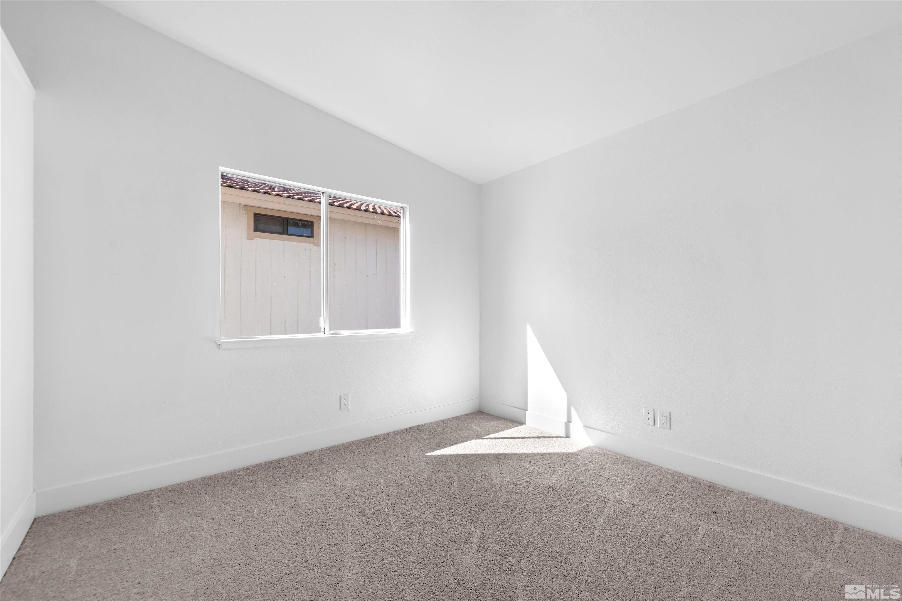 6768 Peppermint Court Reno, NV 89506 - Photo 24 of 40 a view of empty room with window