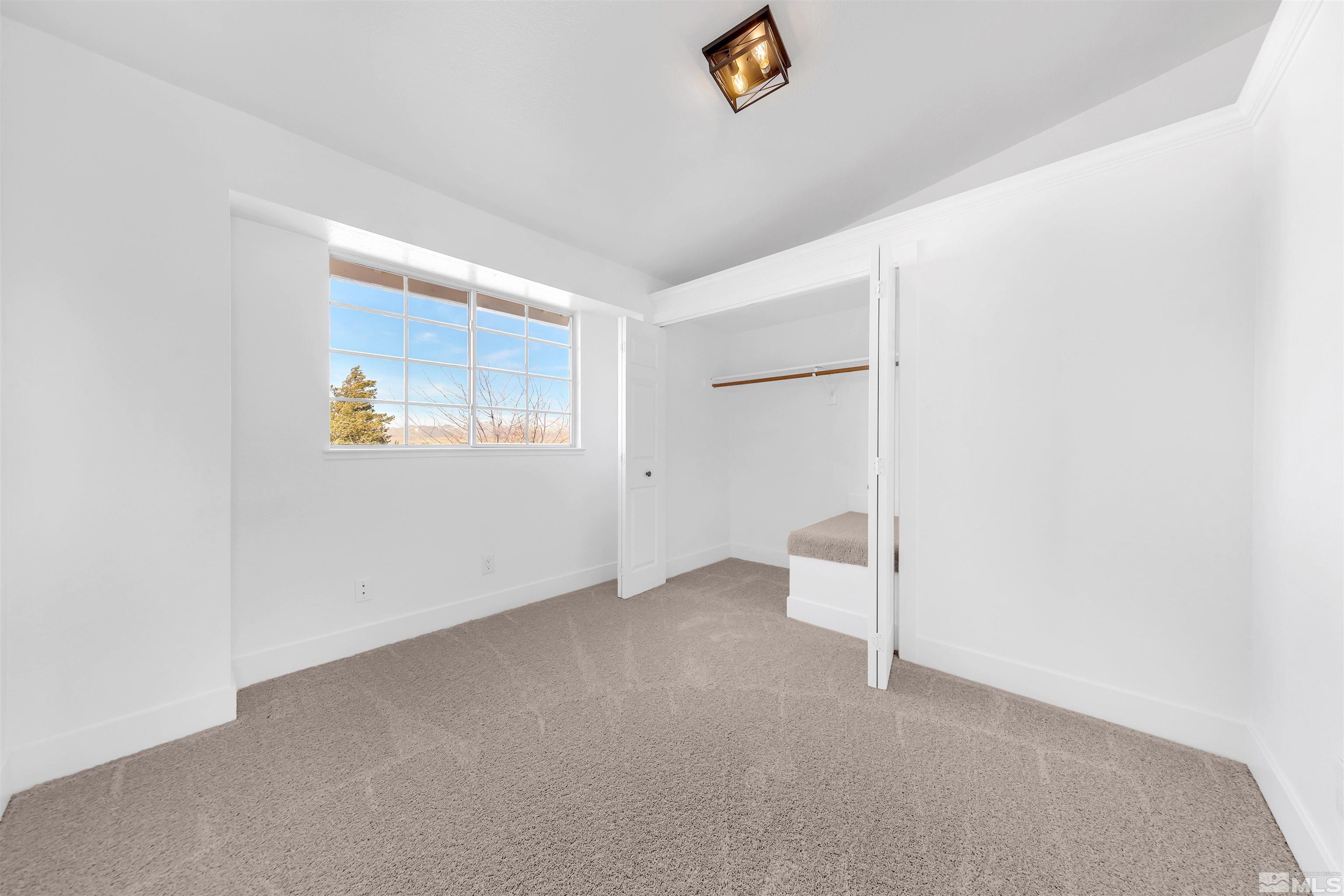 6768 Peppermint Court Reno, NV 89506 - Photo 28 of 40 a view of an empty room with a window