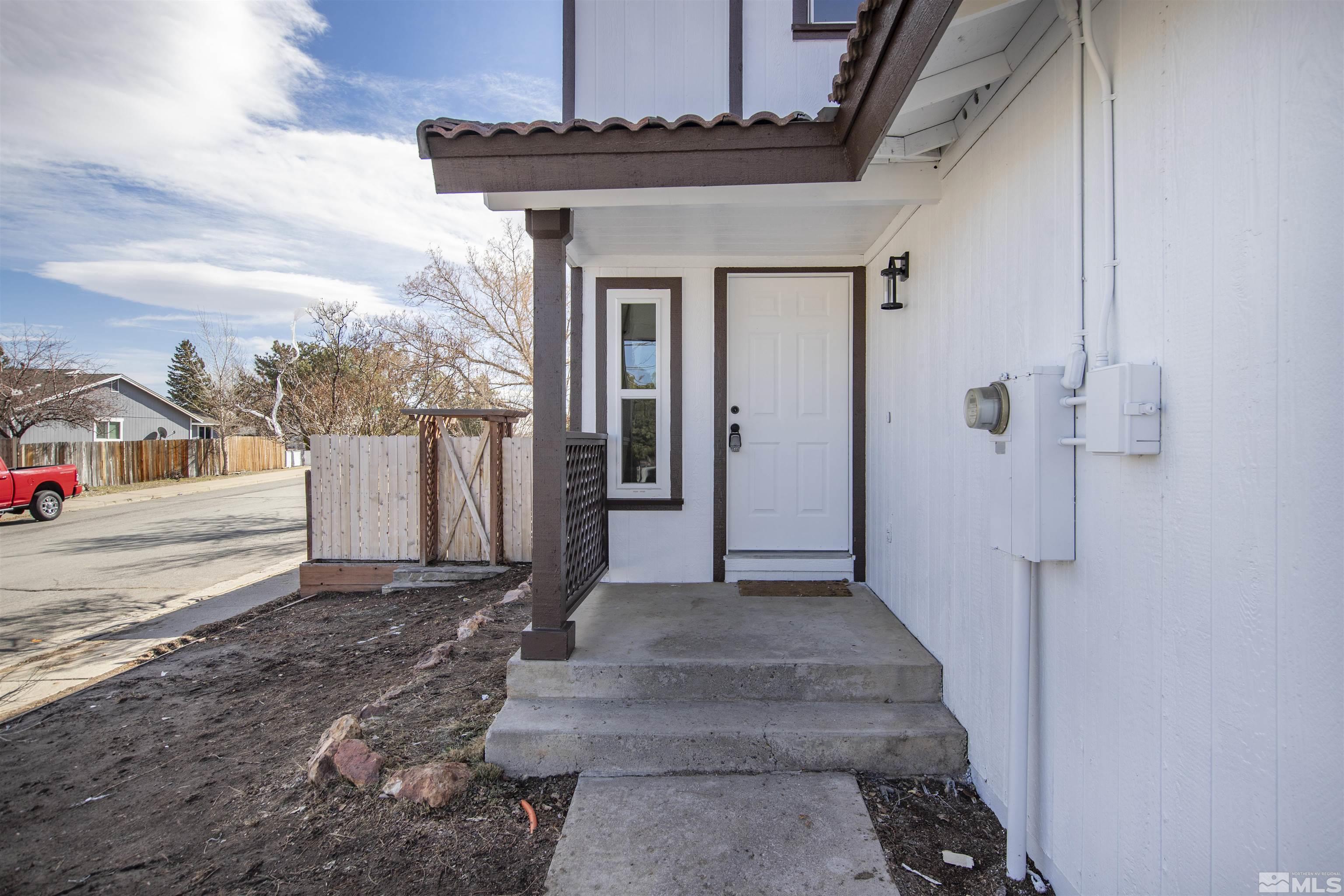 6768 Peppermint Court Reno, NV 89506 - Photo 36 of 40 a view of a front door of the house