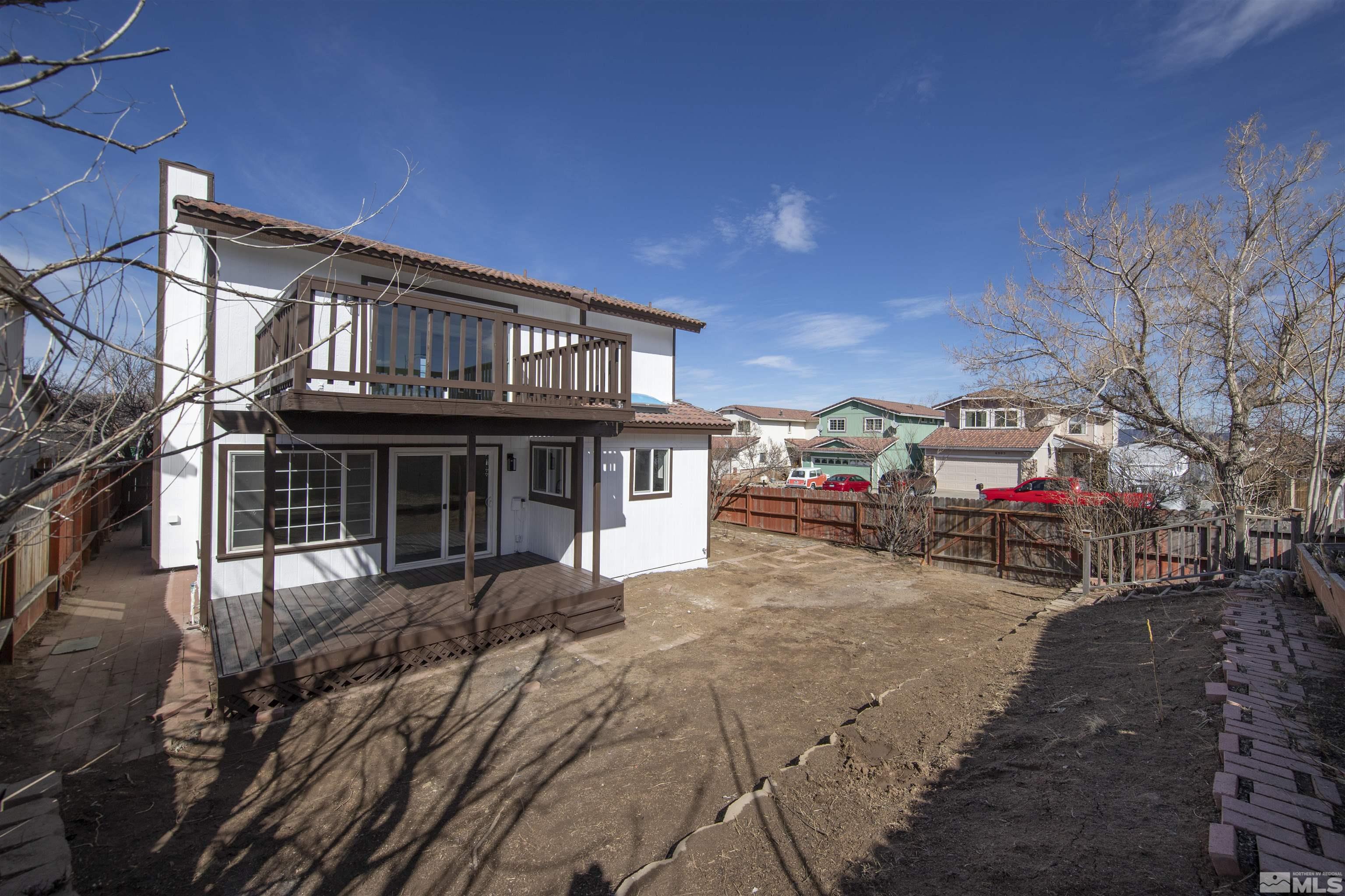 6768 Peppermint Court Reno, NV 89506 - Photo 38 of 40 a view of a car park in front of house