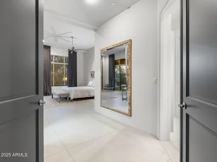 a bathroom with a granite countertop sink mirror and double