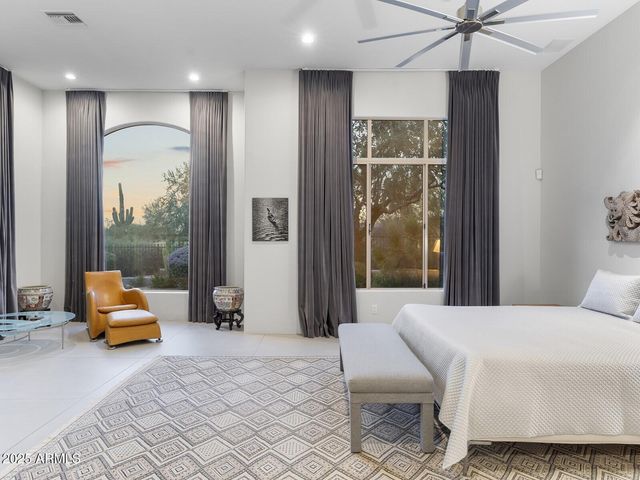 a bathroom with a granite countertop sink mirror and double