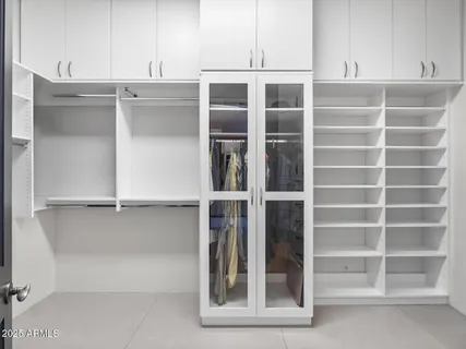 a view of a lake in front of a house