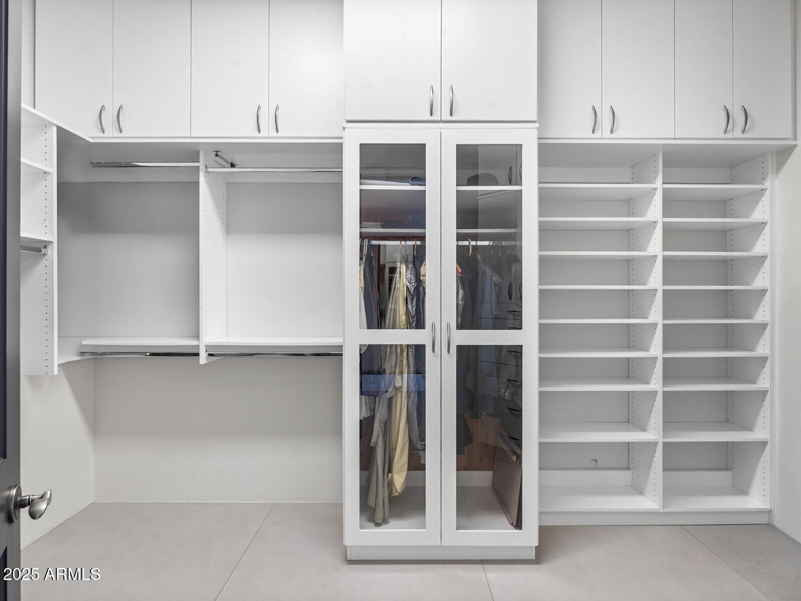 9290 East Thompson Peak Parkway, Unit 142 Scottsdale, AZ 85255 - Photo 36 of 74 a view of an empty room with empty shelves