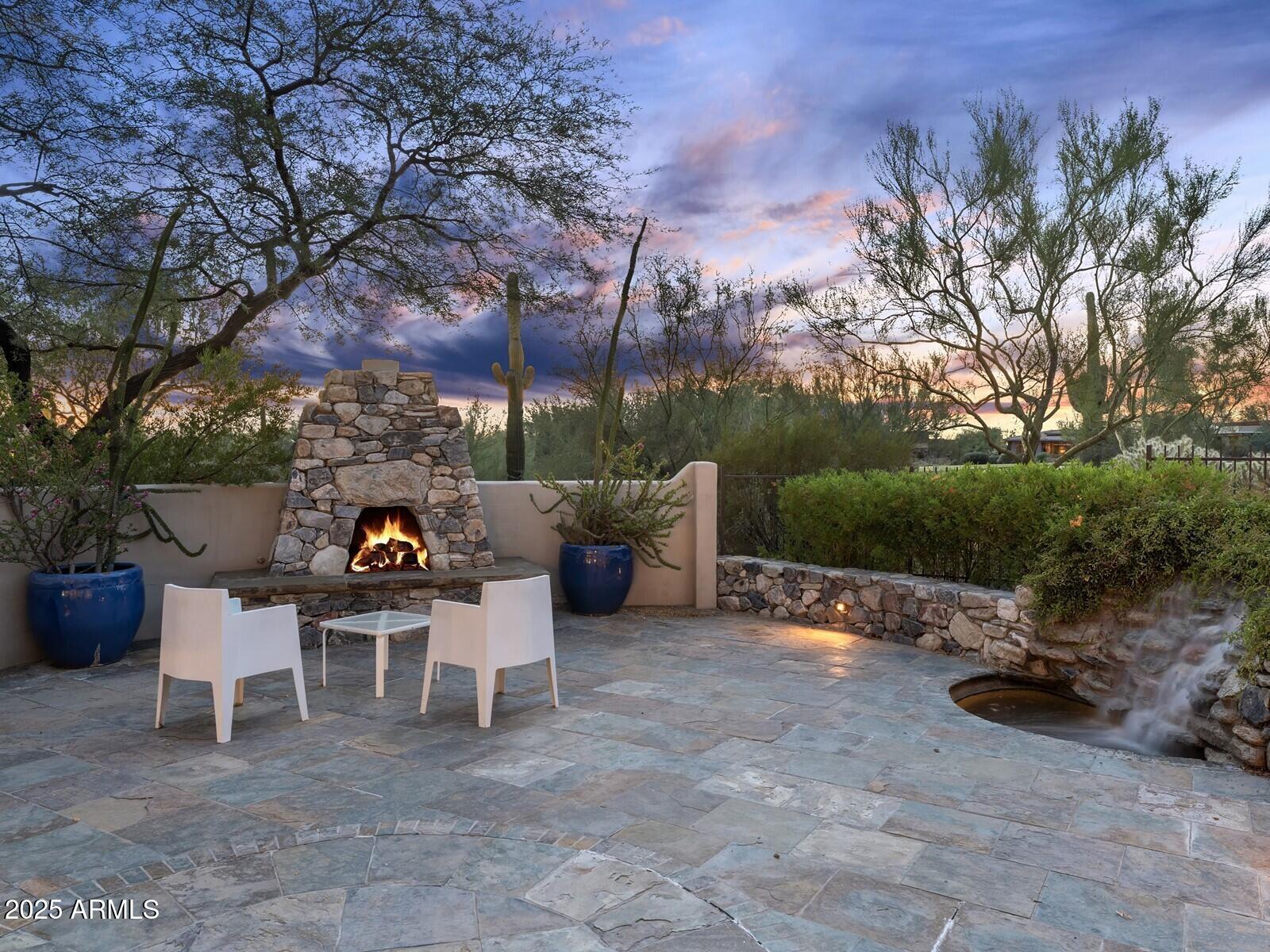9290 East Thompson Peak Parkway, Unit 142 Scottsdale, AZ 85255 - Photo 50 of 74 a view of a outdoor space with a patio
