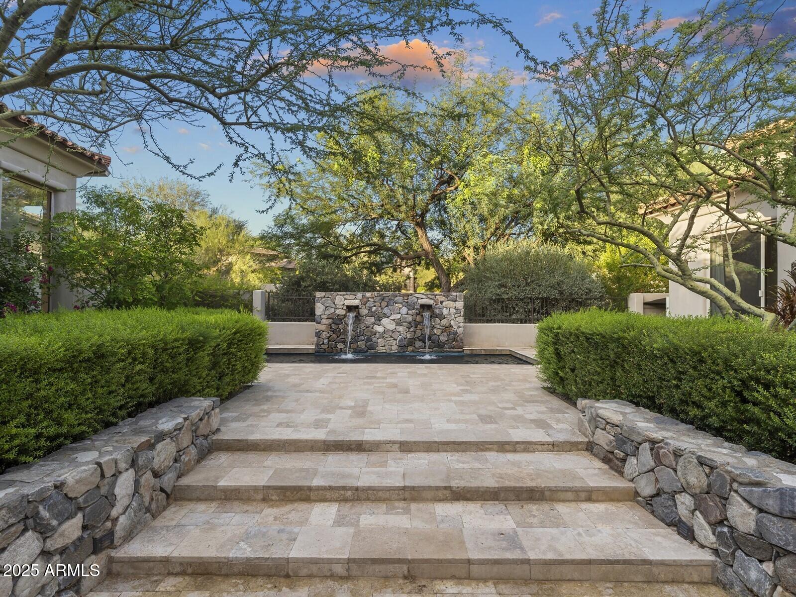9290 East Thompson Peak Parkway, Unit 142 Scottsdale, AZ 85255 - Photo 7 of 74 a view of garden with pathway