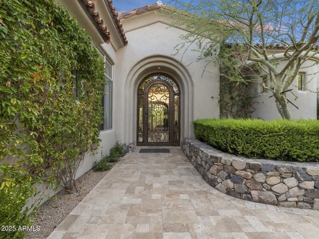 a view of a entrance gate of a house