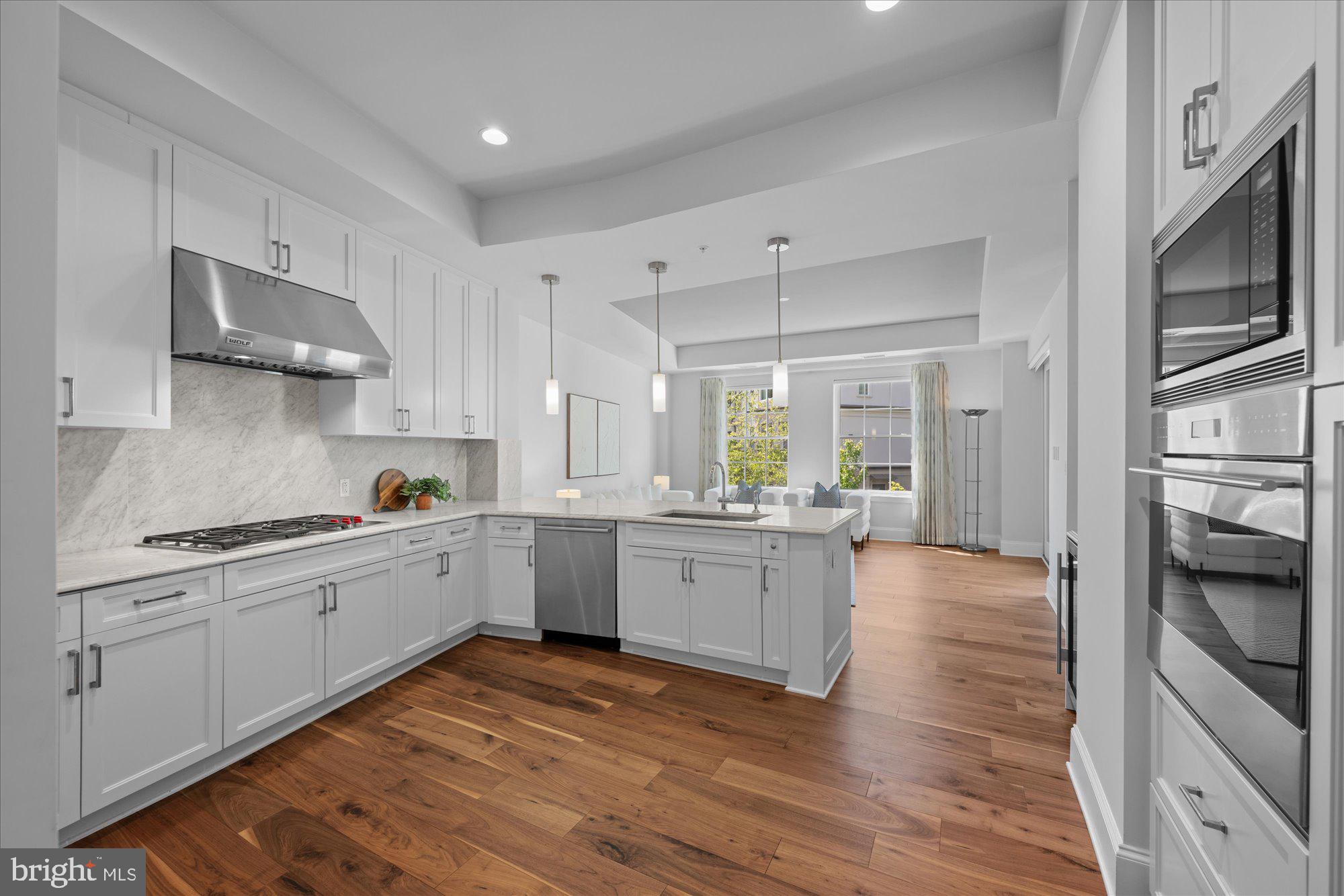 8121 River Road, Unit 423 Bethesda, MD 20817 - Photo 30 of 79 Chef's Kitchen with Wolf Cooktop