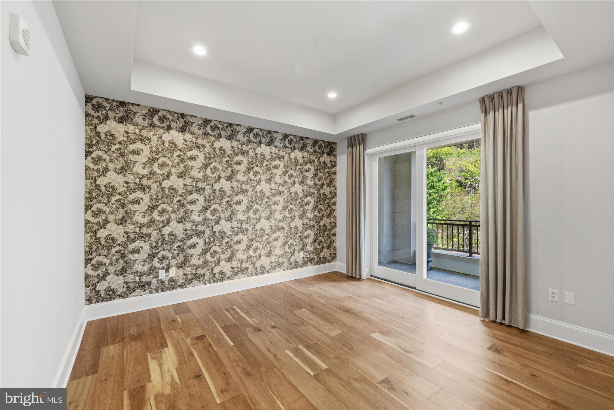 8121 River Road, Unit 423 Bethesda, MD 20817 - Photo 48 of 79 Bedroom with Custom Wallpaper & Access to Terrace