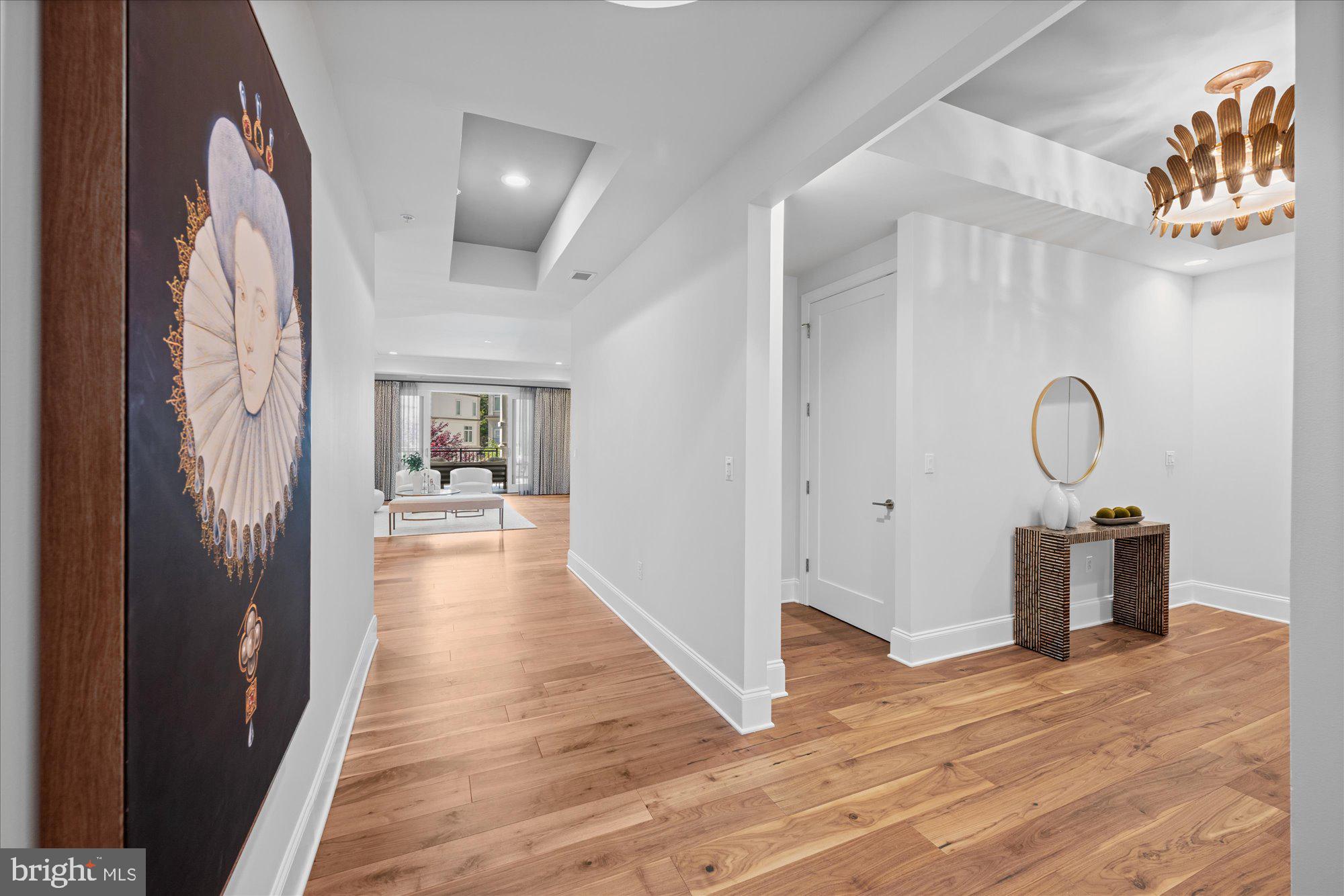 8121 River Road, Unit 423 Bethesda, MD 20817 - Photo 10 of 79 Hallway with Tray Ceilings to Living Area