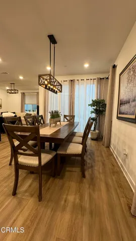 a room with lots of chairs and mirrors