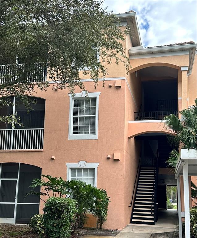 13584 Turtle Marsh Loop, Unit 132 Orlando, FL 32837 - Photo 1 of 21 front view of a house