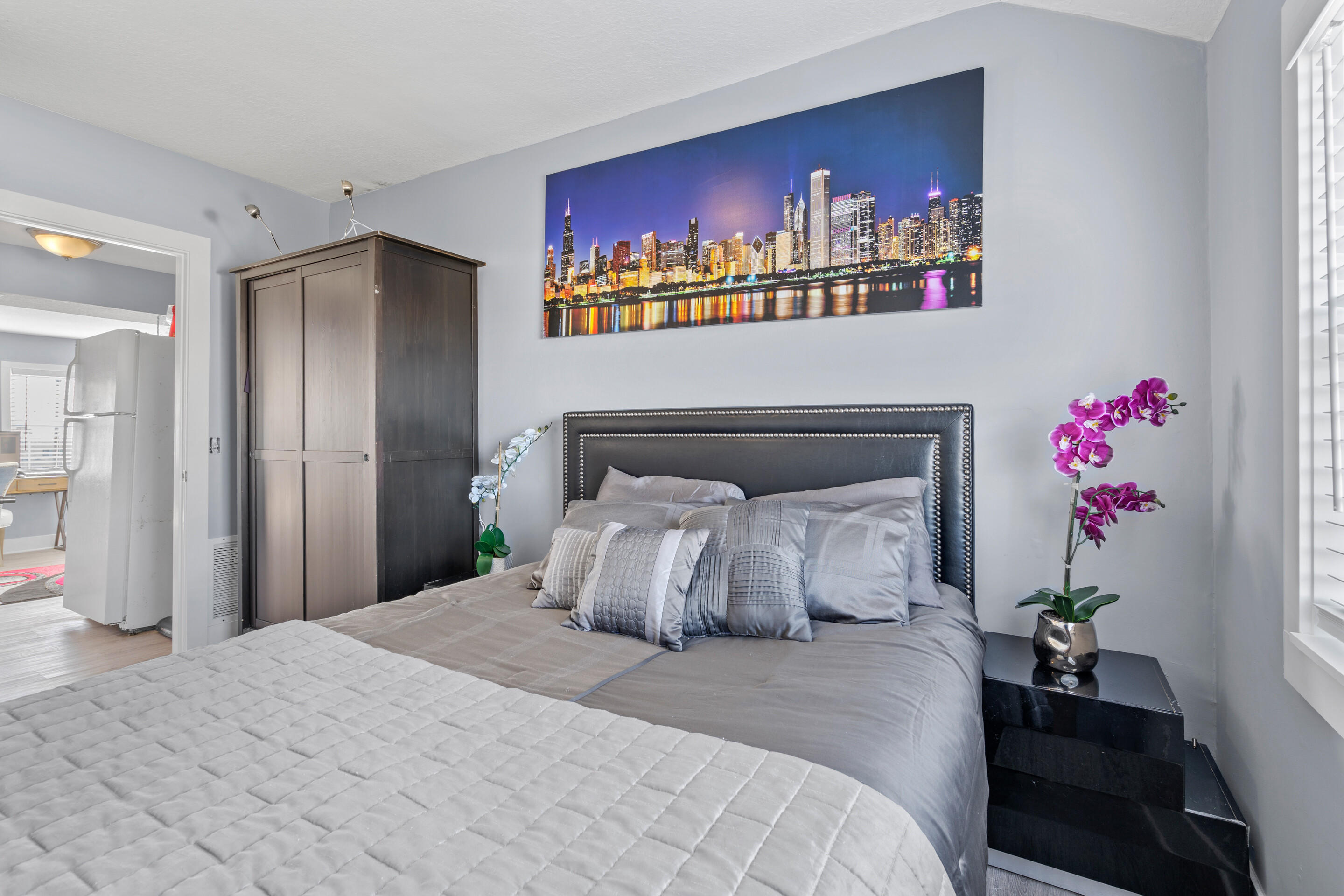 50 Cubbedge Road St. Augustine, FL 32080 - Photo 19 of 26 a bedroom with a bed and a painting on the wall