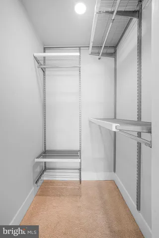 a view of an empty walk in closet