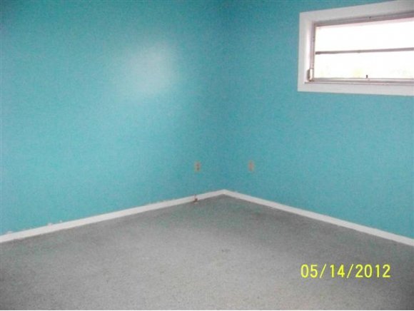 2959 Northeast Gemini Palm Bay, FL 32905 - Photo 9 of 12 a view of empty room with window