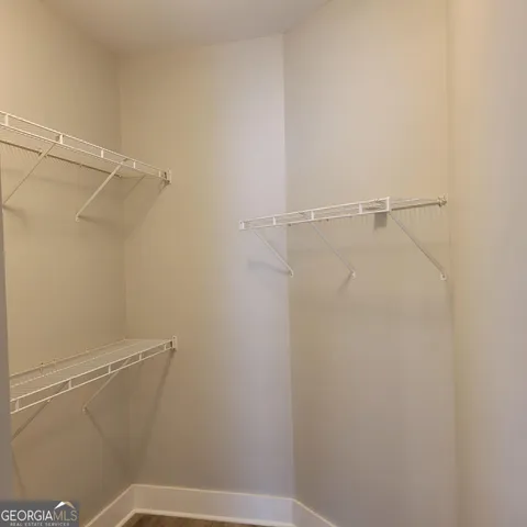 a view of small space with racks on the wall