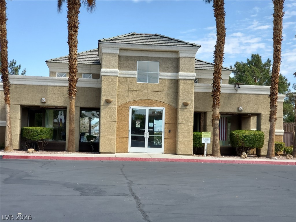 A welcoming facade with structured landscaping and clear entry points invites visitors into this property.