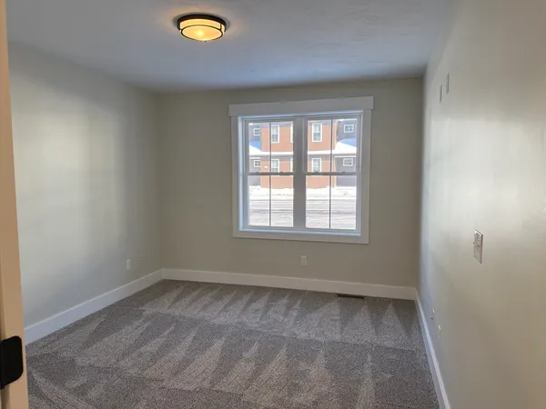a view of a livingroom with a window