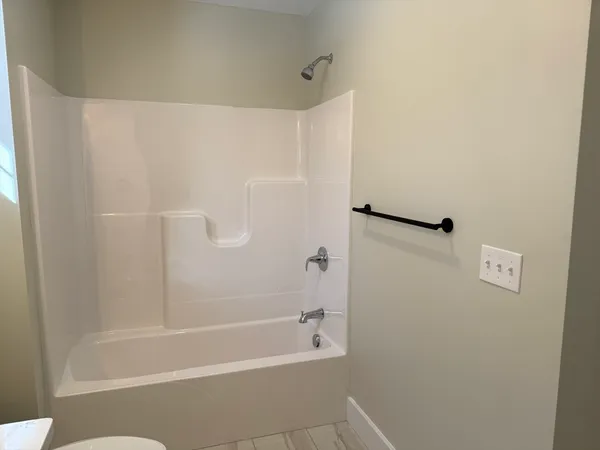 a bathroom with a bathtub