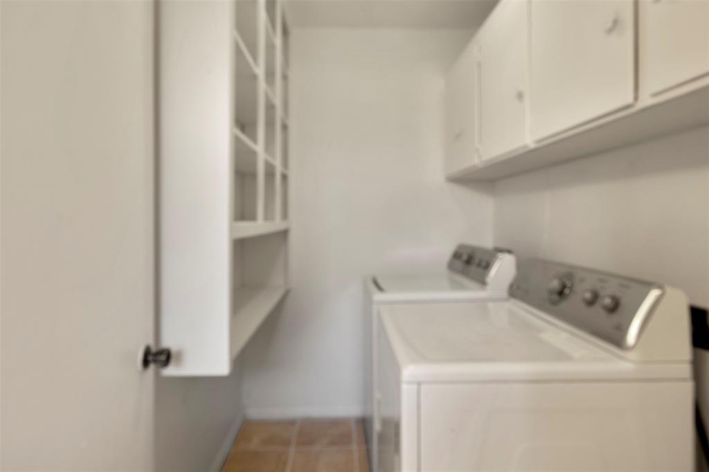 3718 West Rochelle Road Irving, TX 75062 - Photo 14 of 29 a utility room with dryer and washer