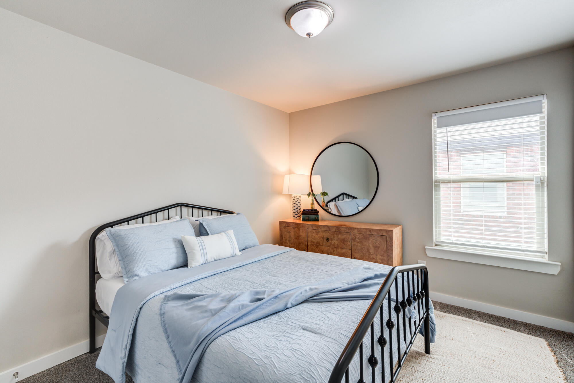 4613 126th Street Lubbock, TX 79424 - Photo 32 of 37 a bedroom with a bed and a window