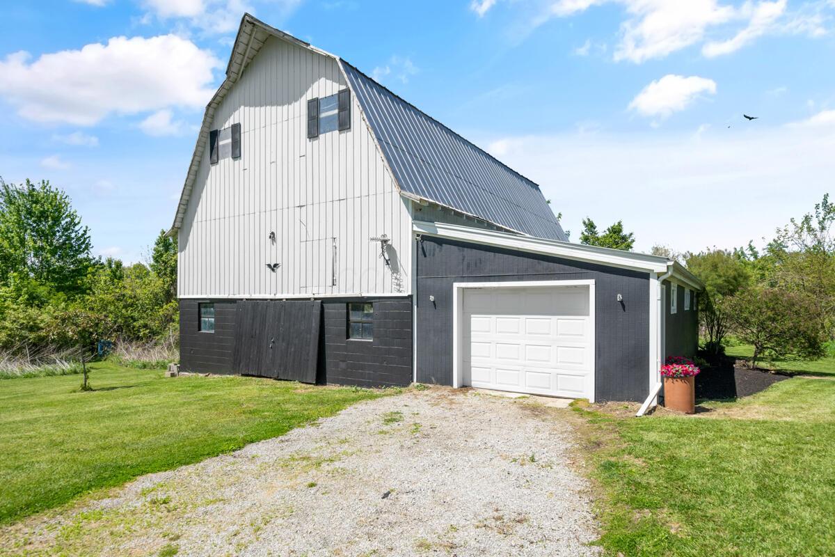 2522 Bean-Oller Road Delaware, OH 43015 - Photo 80 of 93 Front barn view - Tandem garage/workshop & Slider doors underneath barn storage!