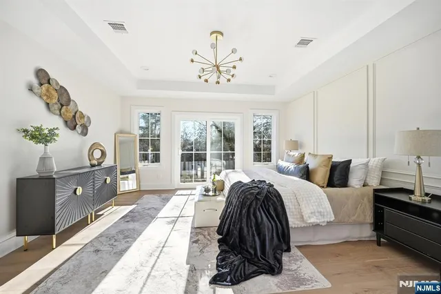 a view of a kitchen with wooden floor